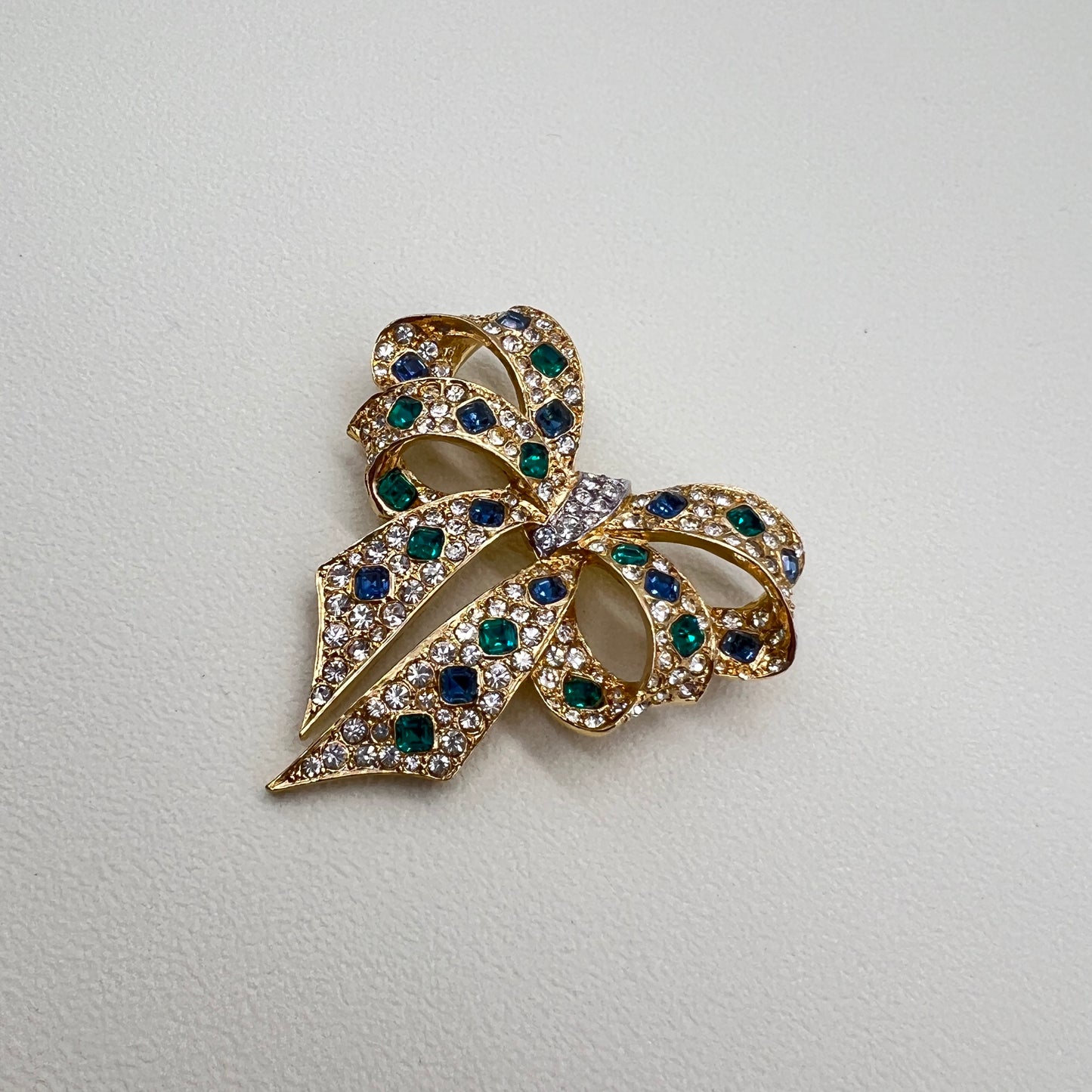 Nina Ricci Vintage Ribbon Motif with Multi Color Stone Golden Brooch