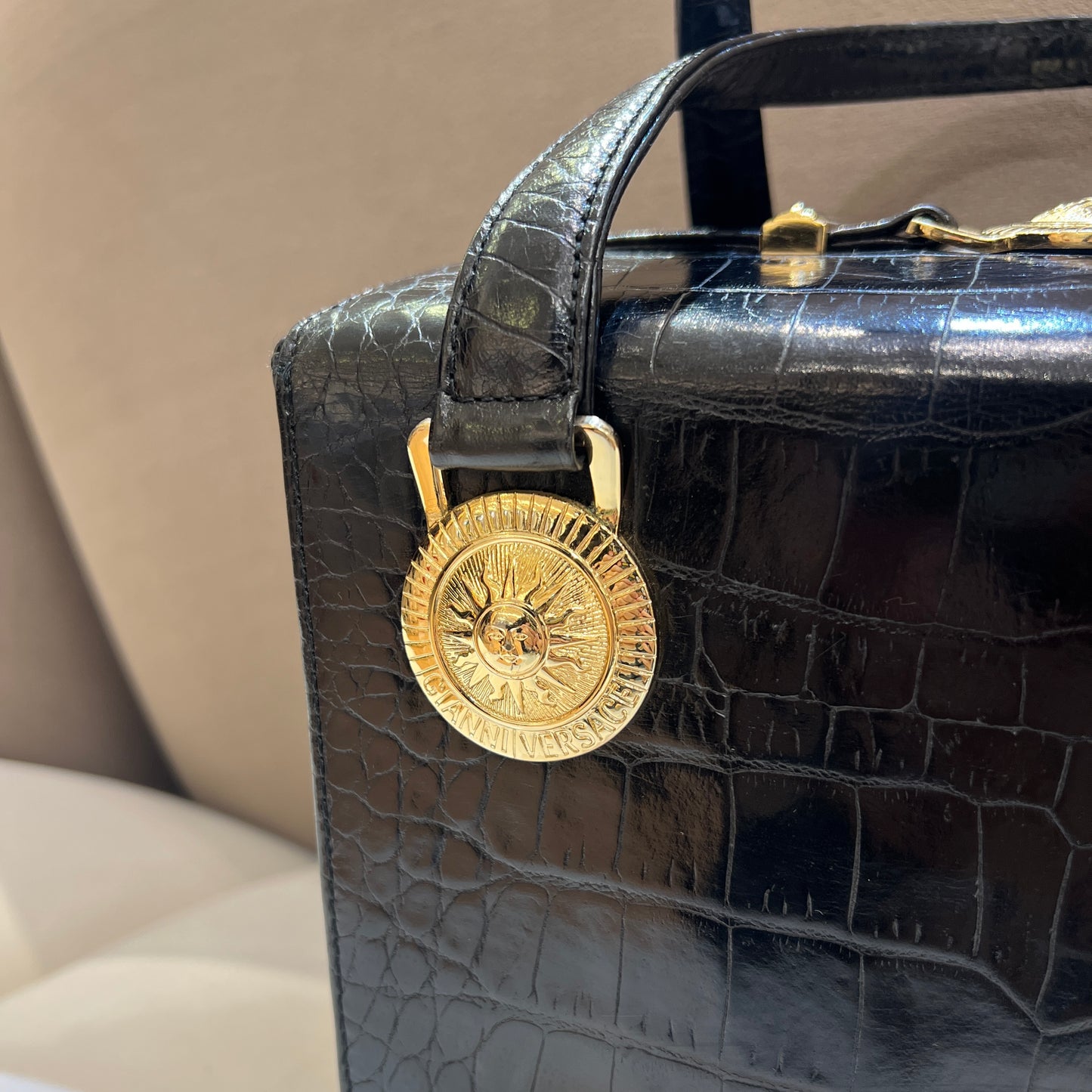 Versace Vintage Golden Sunburst Black Embossed Leather Vanity Box Handbag