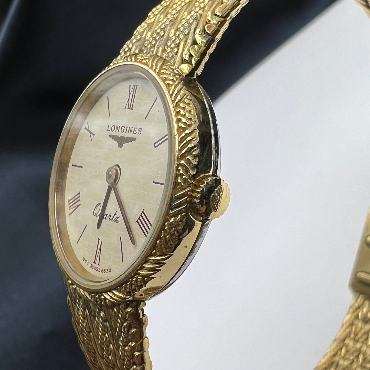 Longines Vintage White Face Circle Watch with Golden Bangle