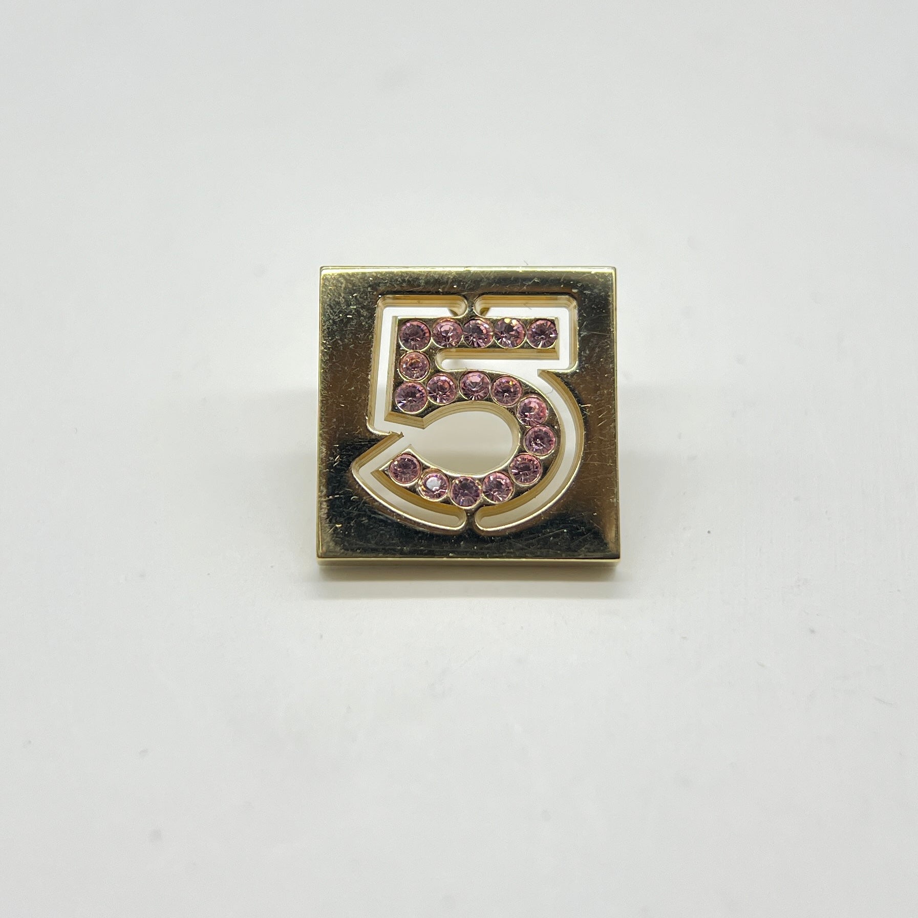 Chanel on sale 5 brooch