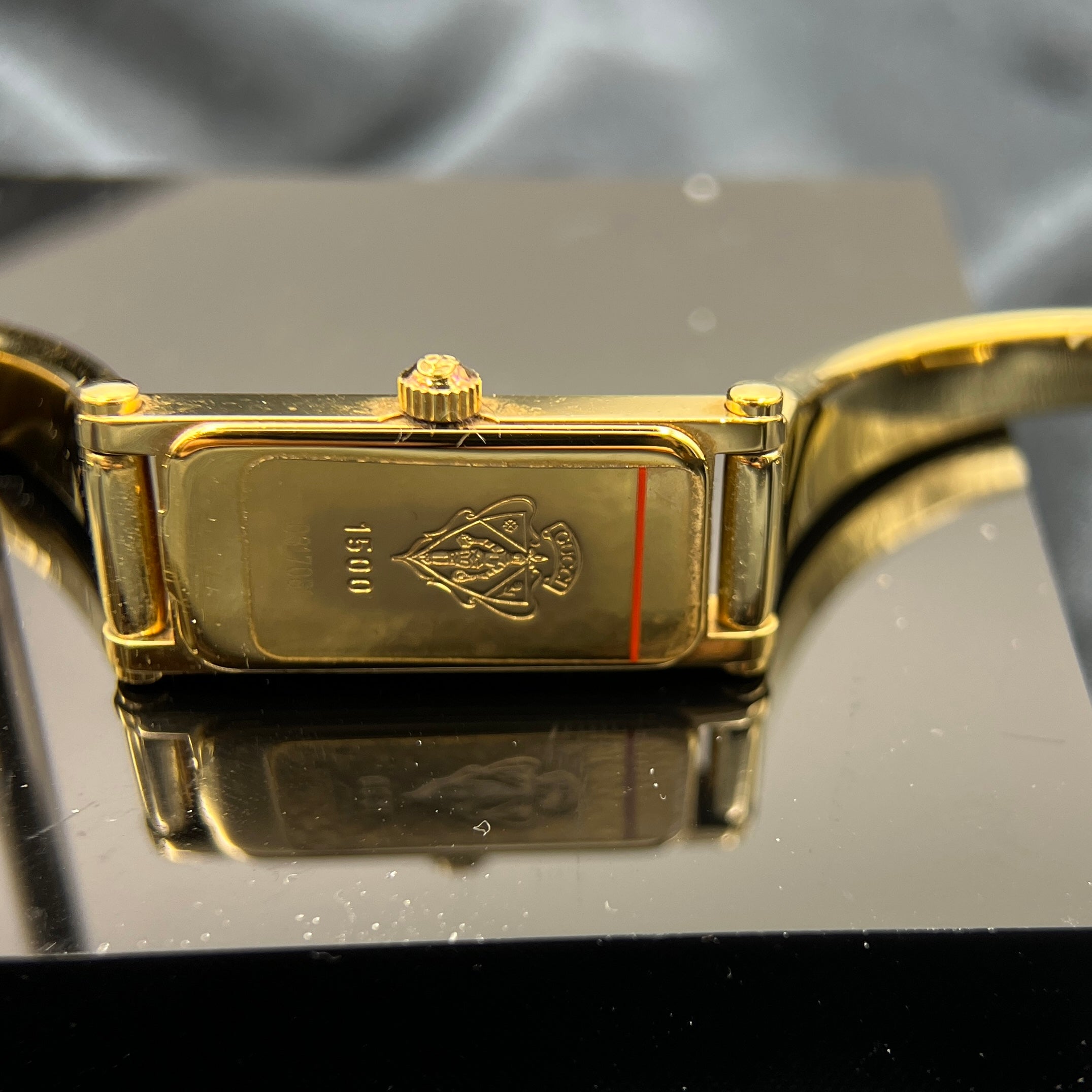 Gucci watch gold bangle best sale