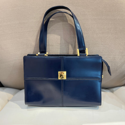 Yves Saint Laurent Vintage Navy Leather Handbag With Gold Logo Plate