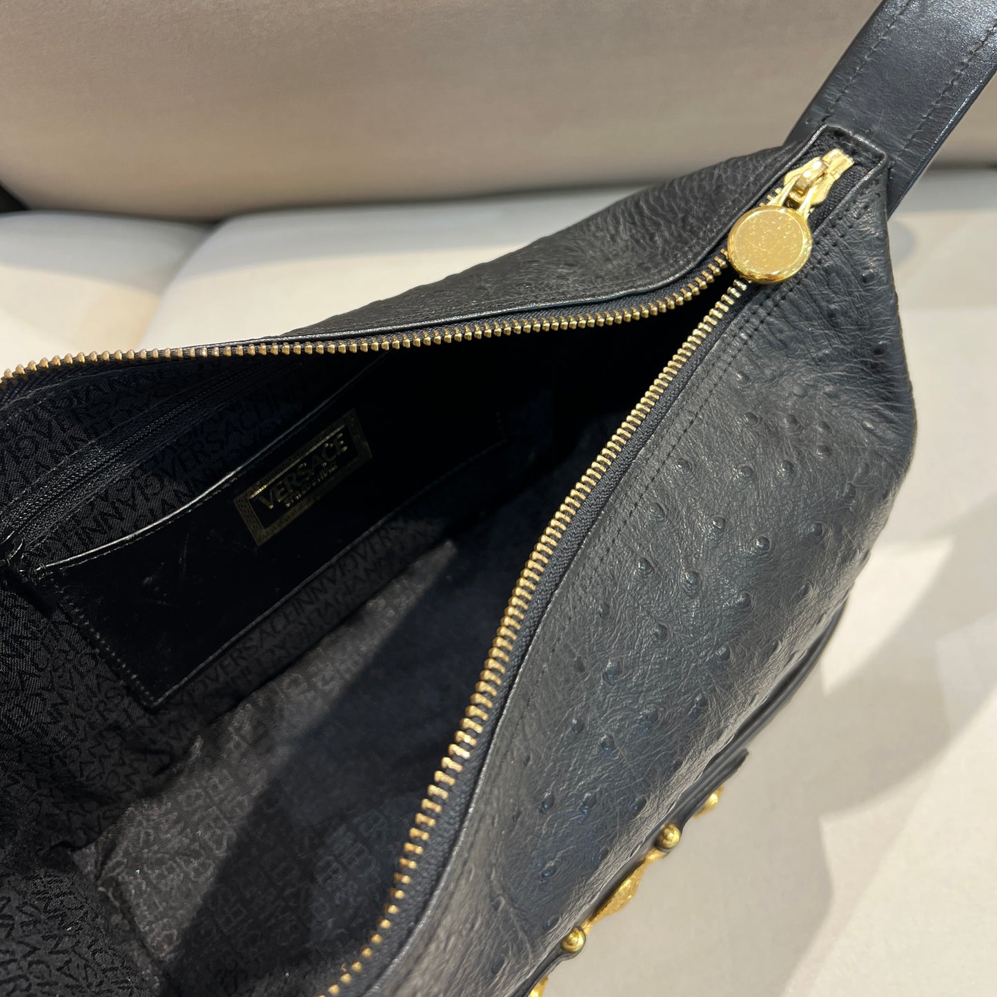 Versace Vintage Black Ostrich Leather Vanity Handbag with Gold Hardware