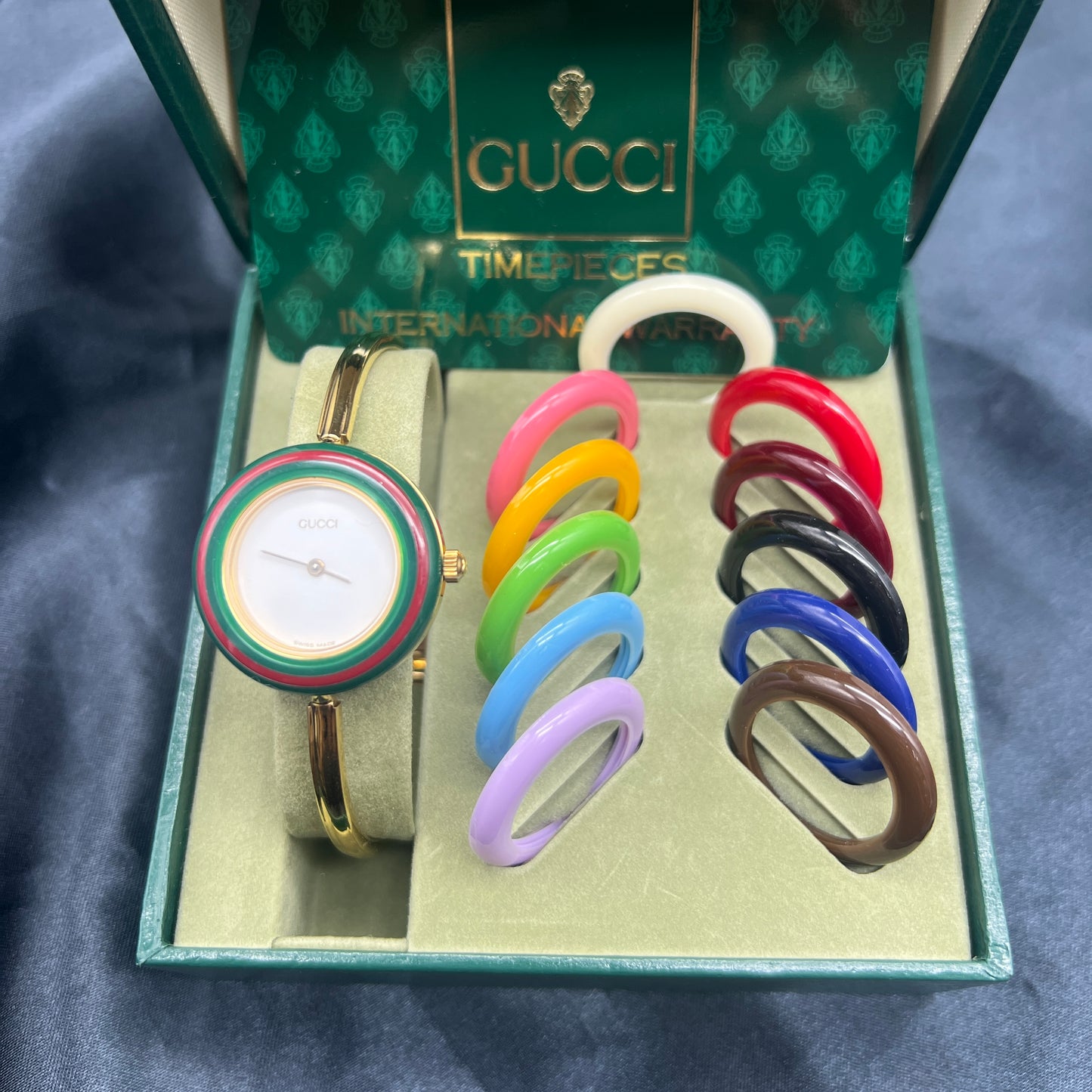 Gucci Vintage Gucci Gold Chain Watch With 12 Changeable Bezels In White Face