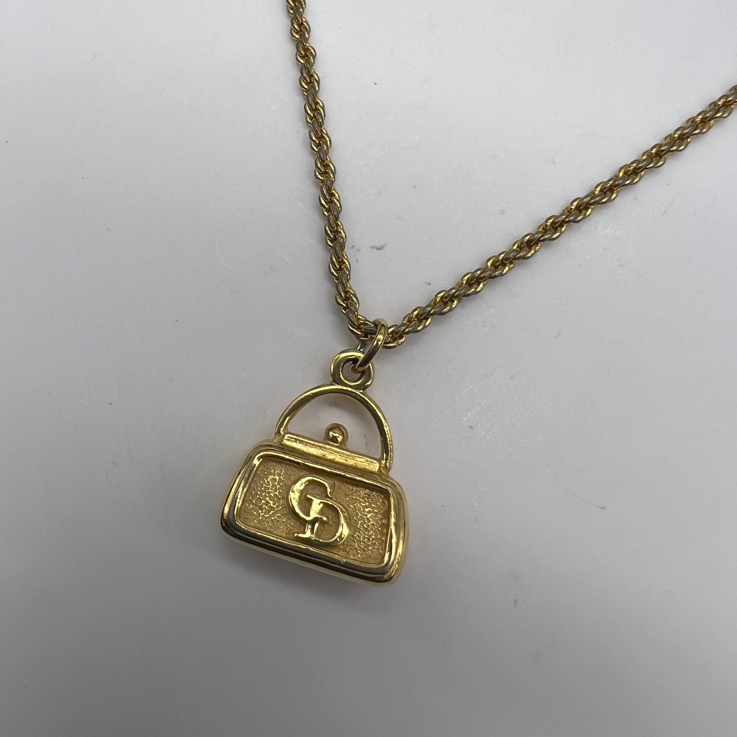 Dior gold lock necklace best sale