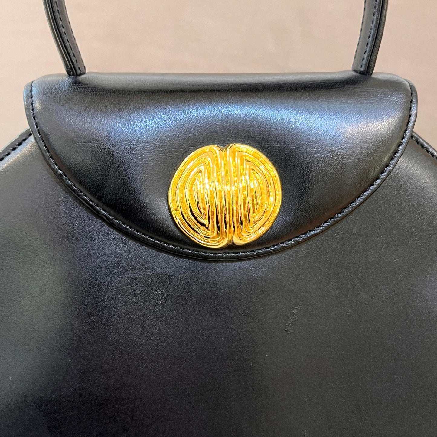 Givenchy Vintage Black Leather Trapezoid Top Handle Bag With Gold Medallion Clasp