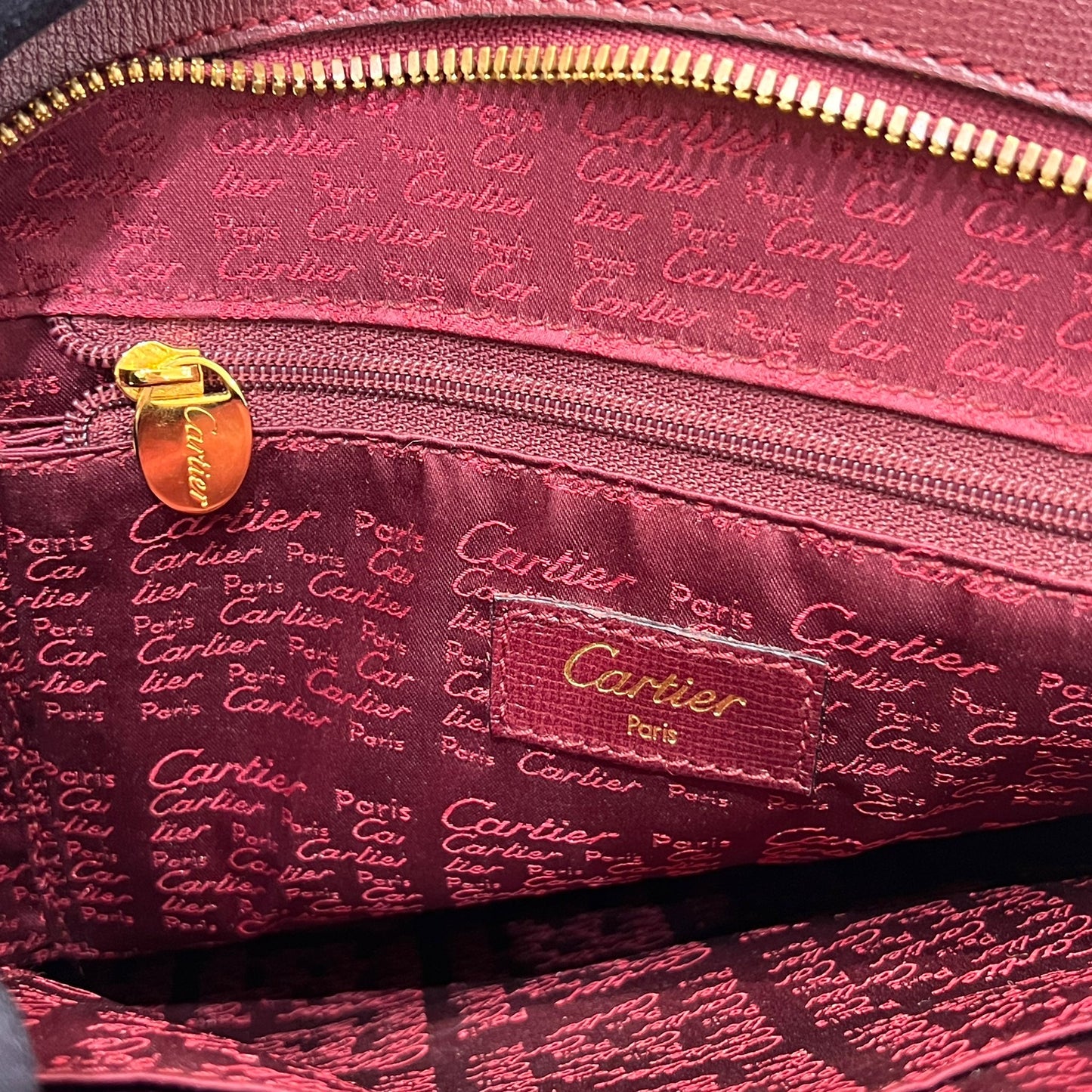 Cartier Vintage Must De Cartier Bordeaux Leather Oval Handbag