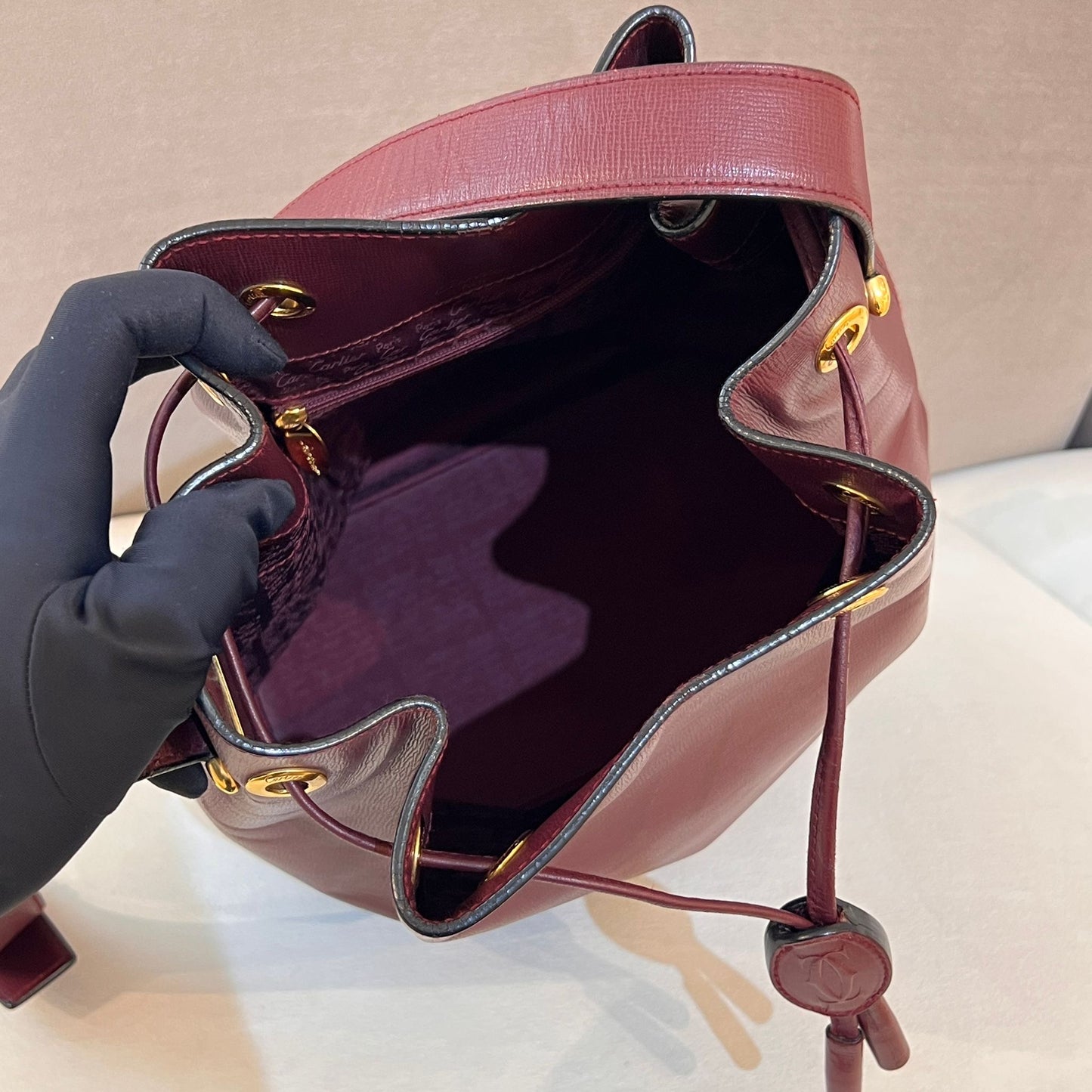 Cartier Vintage Must De Cartier Bordeaux Leather Drawstring Shoulder Bag