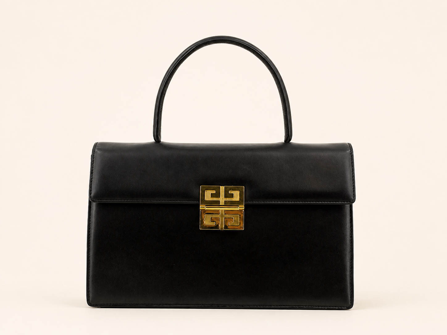 Vintage Givenchy black leather top handle handbag with gold 4G clasp