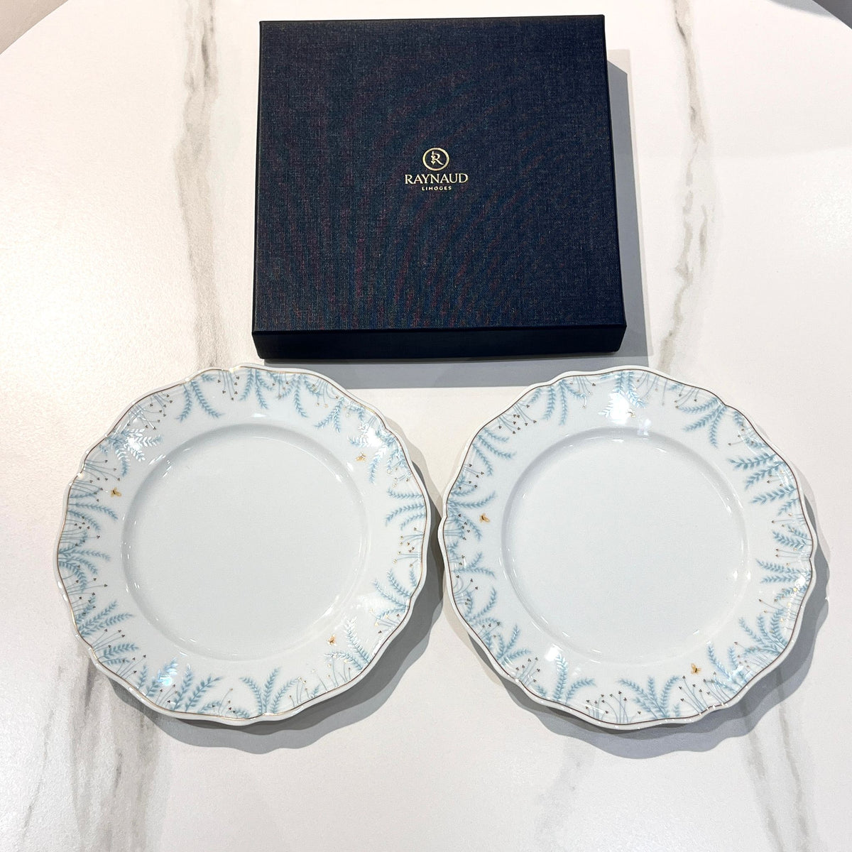Van Cleef & Arpels scalloped porcelain plates front view